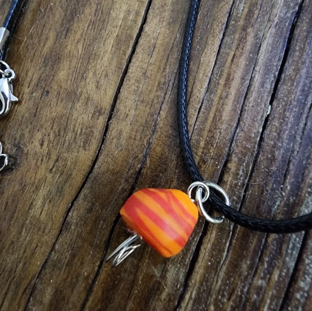 Handmade Black Cord Necklace with Orange with Red Swirl accent triangle bead